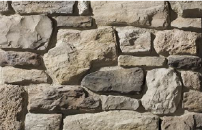 Detail of a batter wall in “sillarejo” technique